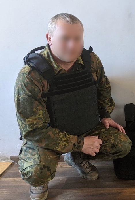 Soldier with donor-supplied body armor